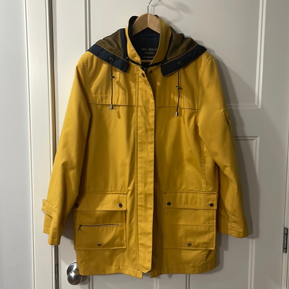 Womens hooded rain jacket with pockets